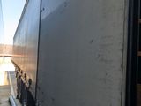 a white truck that is parked in a garage