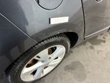 a car that has a sticker on the side of it
