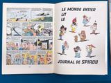a comic book open to a page with cartoon characters