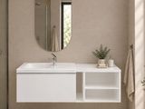 a bathroom with a sink and a mirror in it