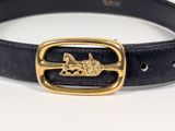 black leather belt with a gold buckle on a white surface
