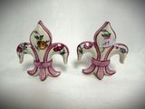 pair of pink and white fleur de lis salt and pepper shakers