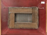 an old picture of a picture frame hanging on a wall