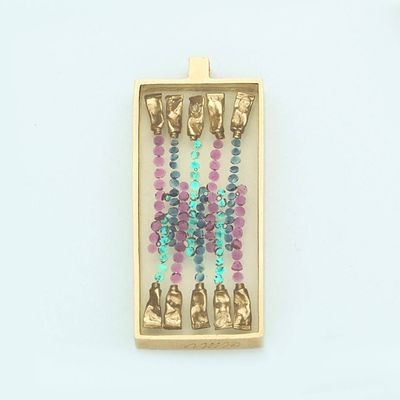 a picture of a gold and blue beaded necklace
