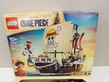 a box of legos with a pirate ship inside of it