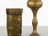 pair of antique brass candlesticks and vases on a table