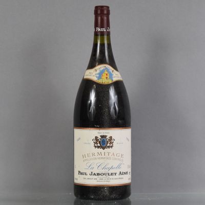 a bottle of wine that is sitting on a table