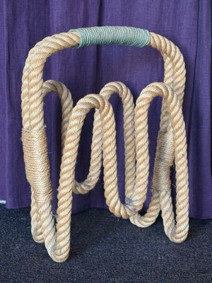 a rope that has been tied up to a pole