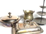 a lot of silver items that are on a table