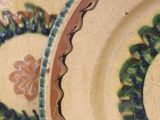 two plates that are sitting side by side on a table