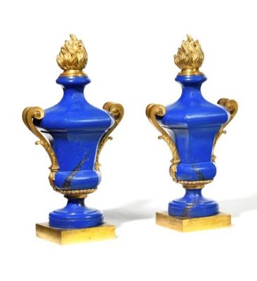 pair of blue and gold vases on wooden bases on a white background