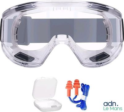a pair of goggles and earplugs on a white background