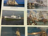 a book with pictures of ships on it on a table