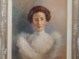 painting of a woman in a white dress in a silver frame