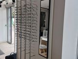 an image of a display of glasses in a store