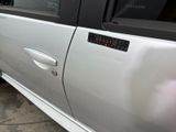 a car that has a sticker on the side of it