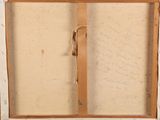 an old book with writing on it sitting on top of a wooden table