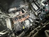 an overhead view of a car engine with the hood open