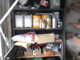 a small storage area with a lot of items in it