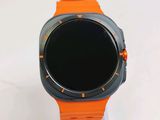 a close up of a smart watch on a stand