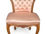 an image of a chair with a pink upholstered seat