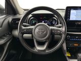 the interior of a car with a steering wheel and dashboard controls