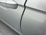 a close up of a car ' s door handle and door handle