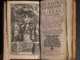 an open book with a picture of a statue on top of it