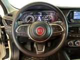 the dashboard of a car with a steering wheel and dashboard controls