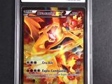 a close up of a pokemon card in a plastic case