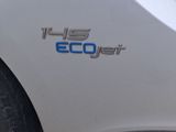 a close up of a car ' s emblem on the side of the car