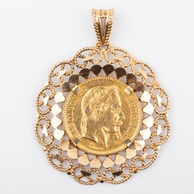an image of a gold coin pendant with a woman ' s face on it