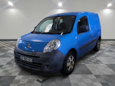 a picture of a blue van parked in a garage