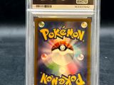 a close up of a pokemon trading card in a plastic holder