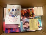 a box full of books that are sitting on a table