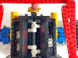 a lego model of a machine that is sitting on top of a table