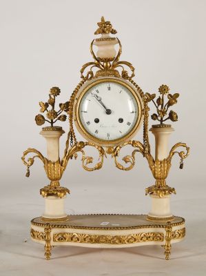 a clock that is sitting on top of a table