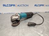 an electric angle grinder with a cord attached to it