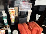a shelf with a lot of personal care items on it