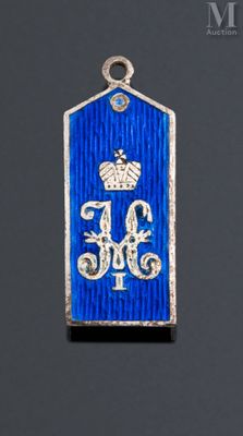 a close up of a medal with a crown on it