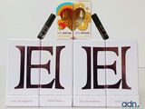 three boxes of cigarettes sitting on top of each other