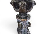 a vase that is sitting on a pedestal on a white background