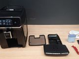 an image of a coffee machine and other items on a table