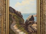 an oil painting of rocks and water on a rocky shore