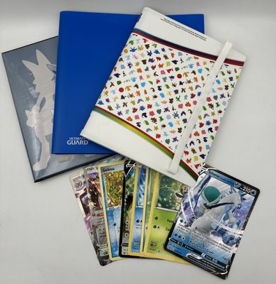 a lot of cards and a book on the table