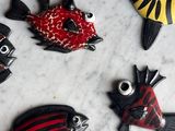 many different colored fish that are on the table