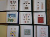 many different types of stamps on the pages of a book