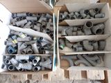 a box full of pipe fittings and a box full of pipe fittings