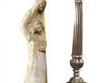 pair of silver candlesticks with a statue of a woman holding a child