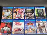 a bunch of video games sitting on top of a table